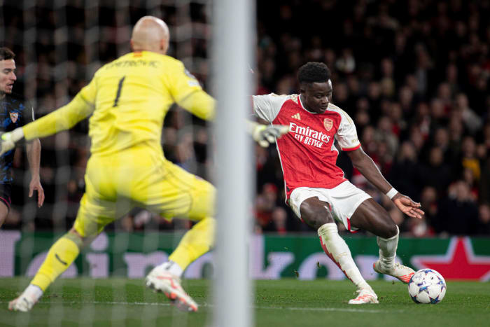 Bukayo Saka pictured (right) scoring for Arsenal in a 2-0 win over Sevilla in November 2023